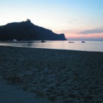 Beach in Oliveri with Tindari on the hill, Sicily, Italy