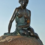The Story of the little Mermaid standing by the Waters of the Copenhagen Harbour | Denmark