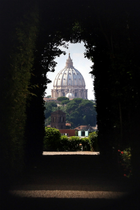 St. Peter's Basilica seen through a keyhole at the Villa Malta, Rome, Italy