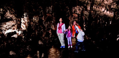 A family enjoying a visit to Postojna Cave, Slovenia